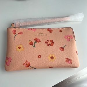 Coach corner zip wristlet with mystical floral print
